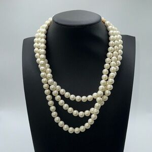 Vintage Marvella triple strand faux pearl necklace beautiful flower closure